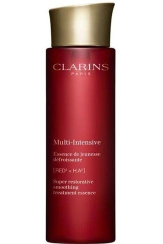 Clarins Super Restorative Smoothing Treatment Essence čisticí mléko 200 ml Clarins